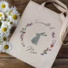 sac lapin assis
